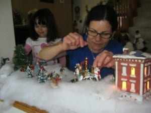 My mom with my daughter decorating for Christmas together. 