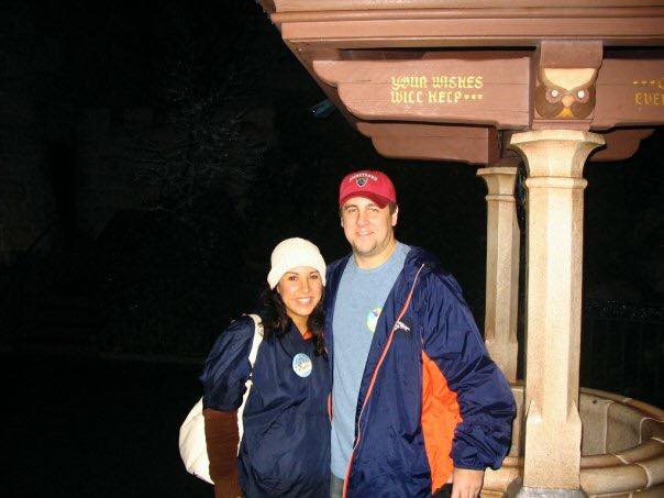 My husband and I on the night we got engaged at Snow White's Wishing Well. We were all bundled up that December night at Disneyland.